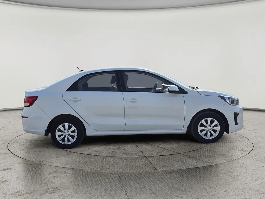 2023 Kia Pegas LX 