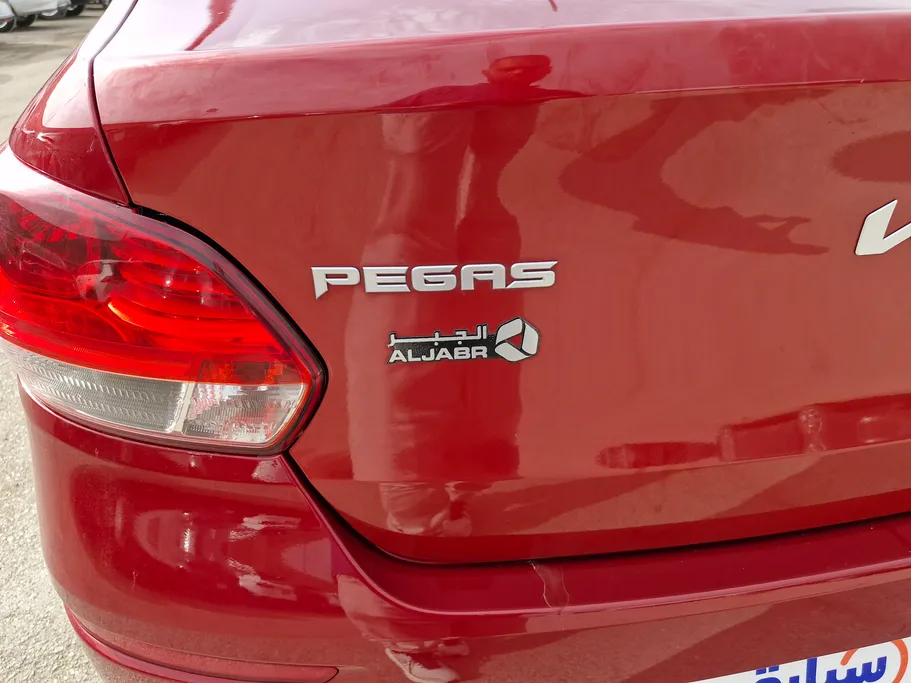 2023 Kia Pegas LX 