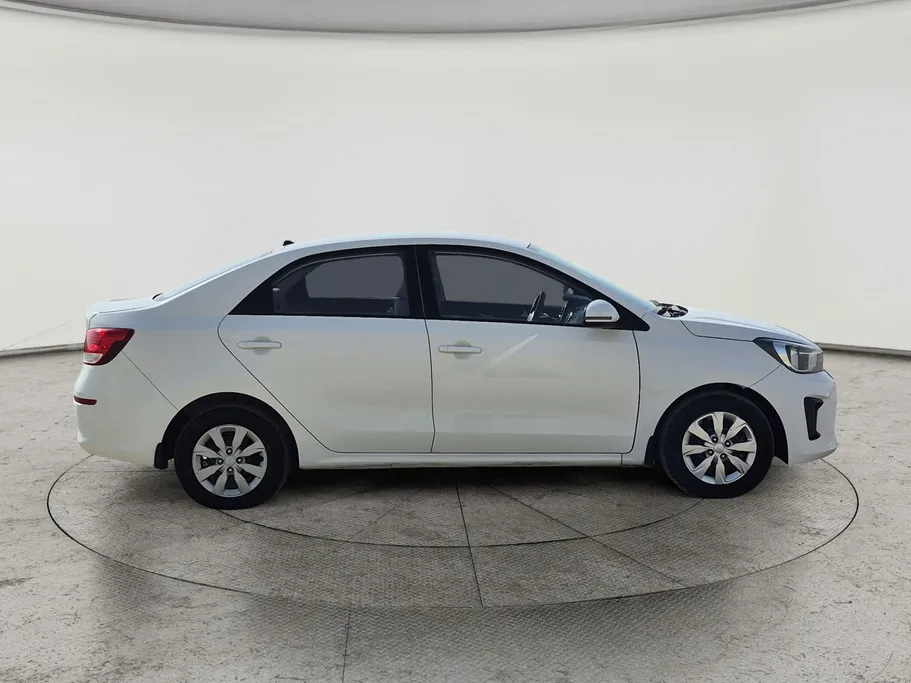 2023 Kia Pegas LX 